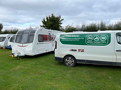 Bailey caravan being serviced in a storage yard ready for a new season of touring, easy for a mobile workshop